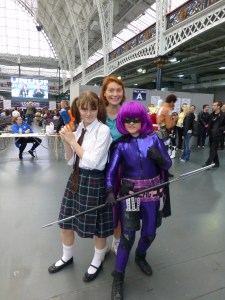 Emily dressed as Mindy and someone dresses as Hit Girl. I'm at the back looking confused.