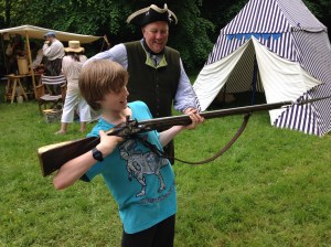 George having trouble with his gun, I don't think his arms are long enough.