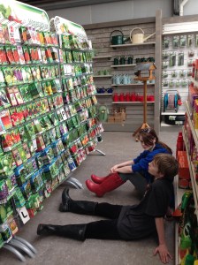 They stared at the packets of seeds in front of them. Then they sat down on the floor.