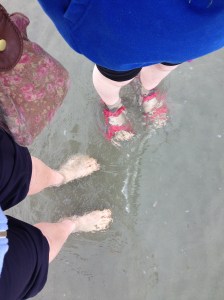 We're paddling in the sea, and it's bloody cold!